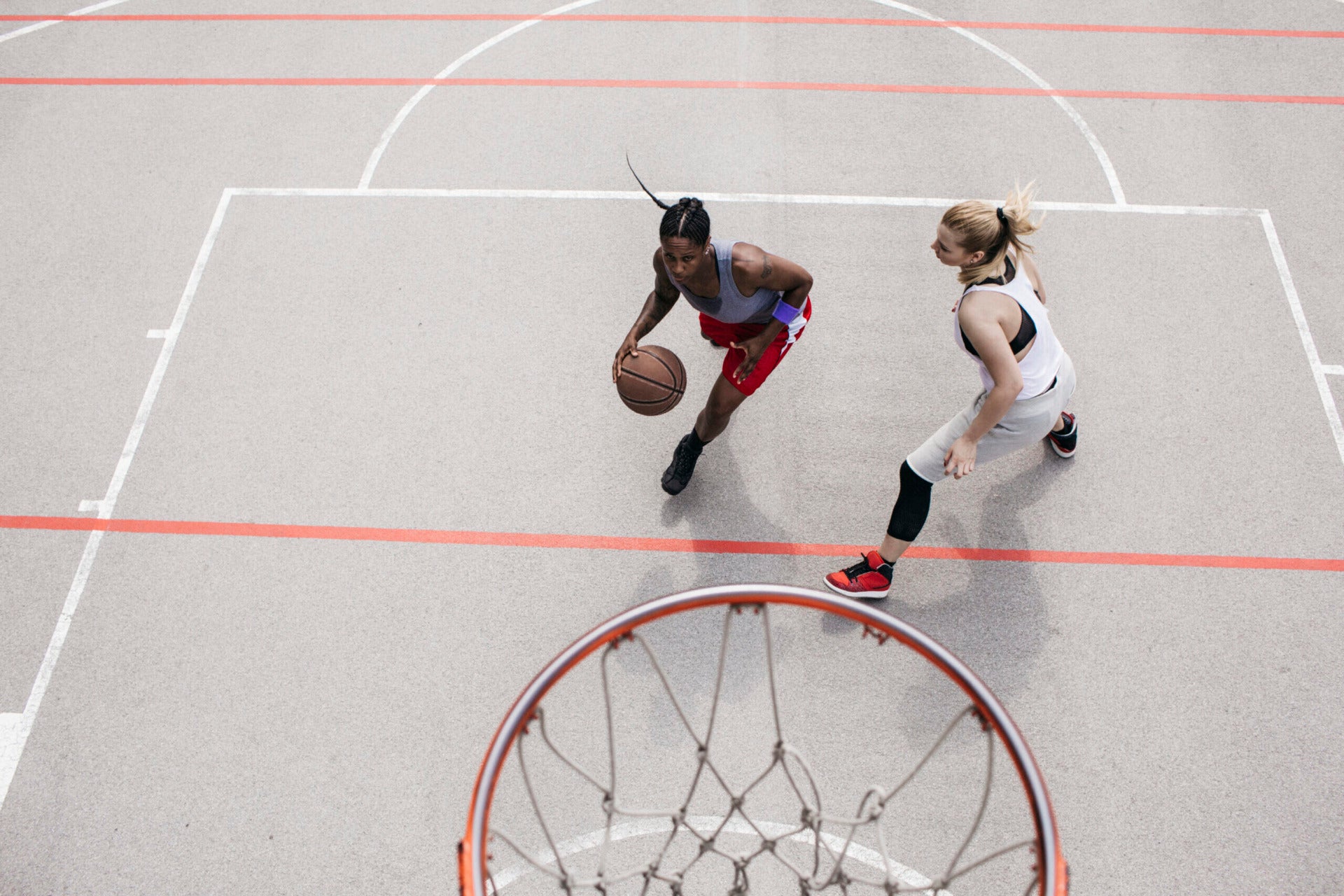 Two basketball players pivot around one another to line up a shot. It represents a strategic reorientation on AI competition with China.