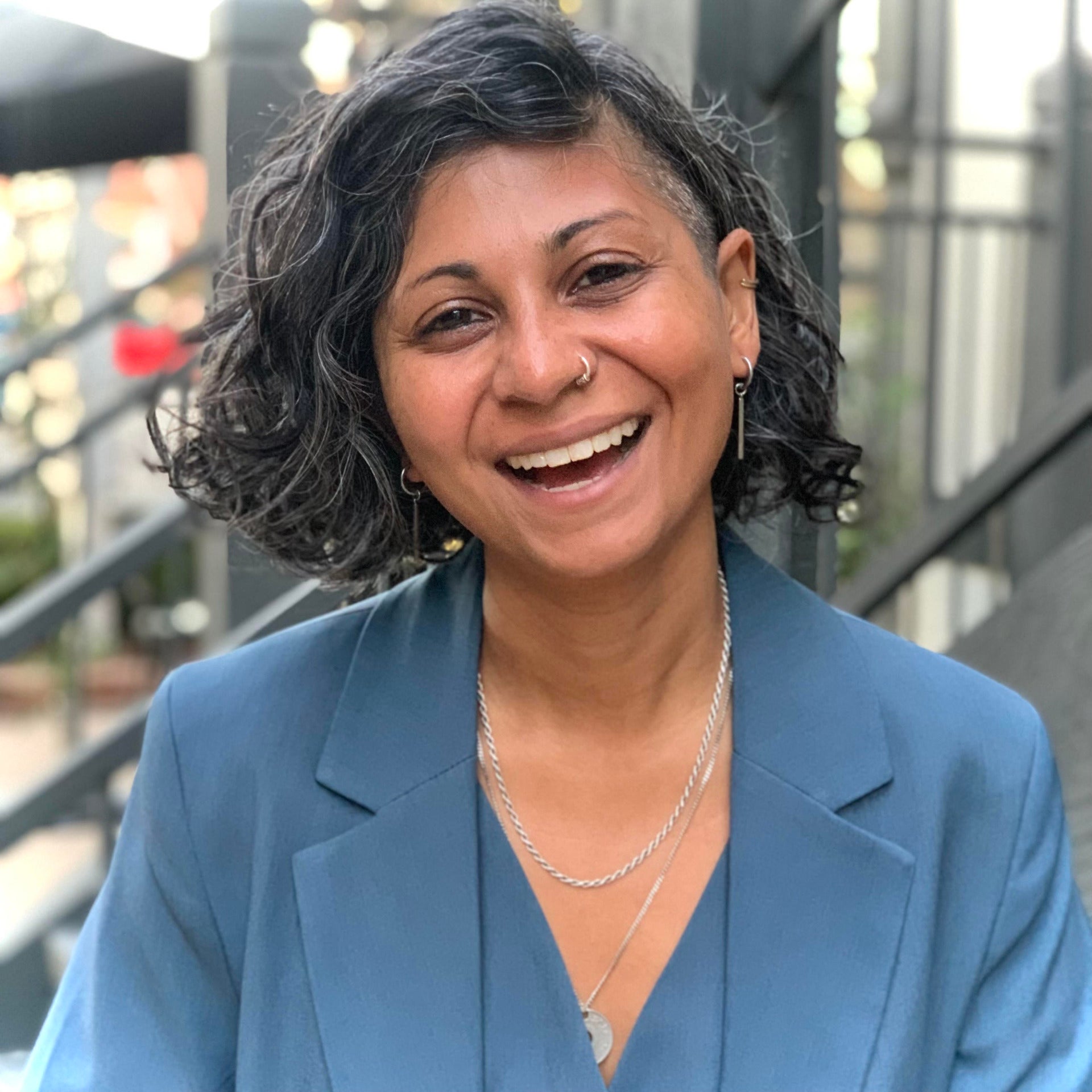 Amira Dhalla's headshot.