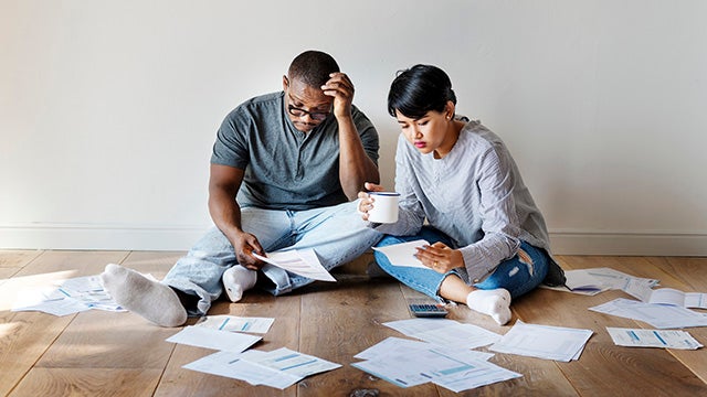 Couple managing debt