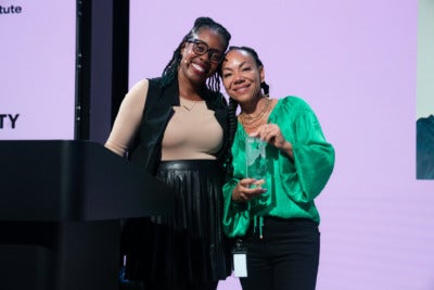 A photo of Shijuade Kadree and Oona King.