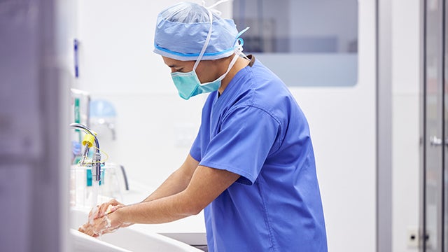 medical profession washing an