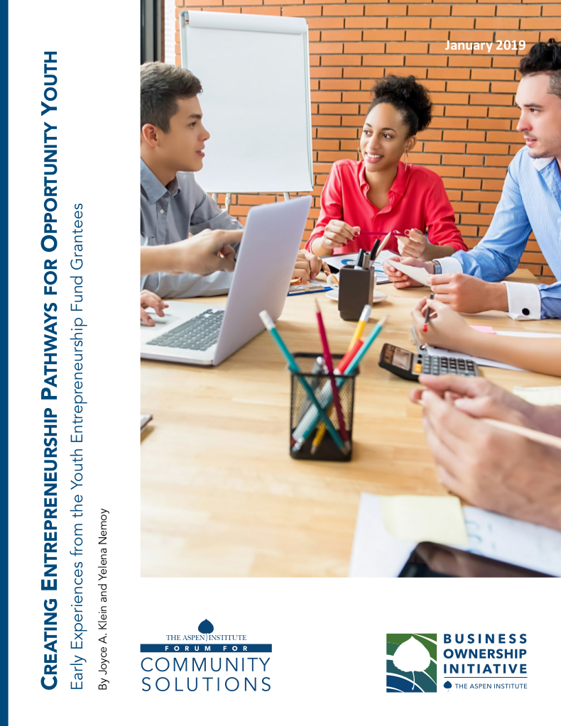 Young people meeting around a conference table